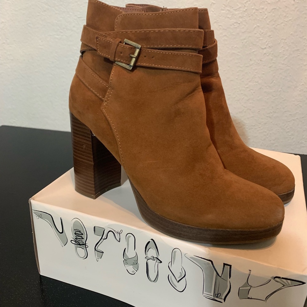 Brown high heeled boots